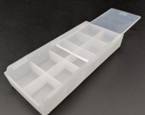 Tray with slide on lid