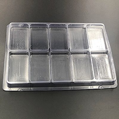 Plastic shipping tray with 3.75" cavities.