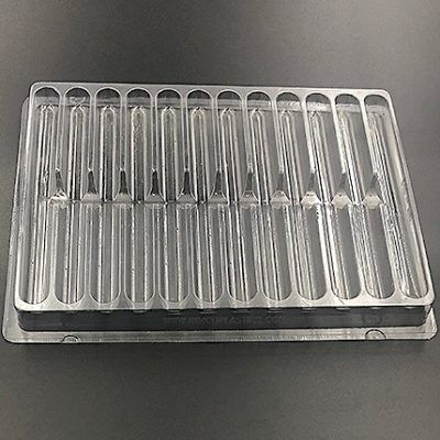 Plastic shipping tray with 12 cavities