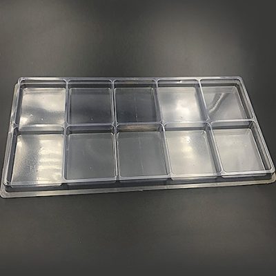 Plastic shipping tray with 4.8" cavities.